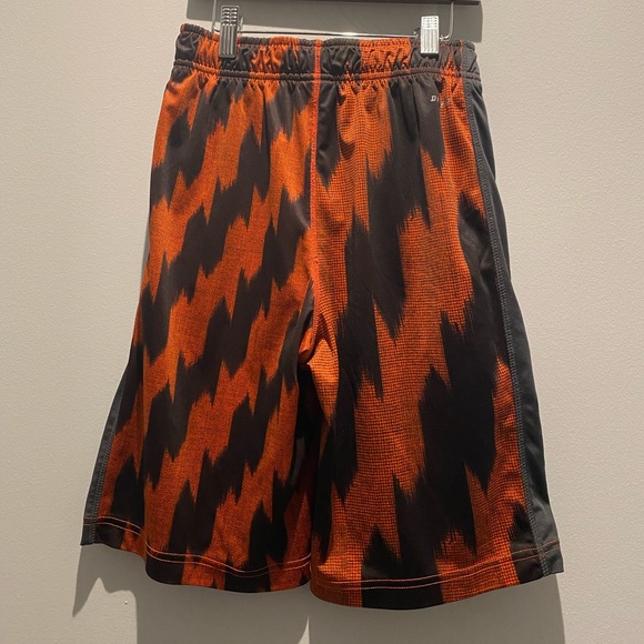 Nike Dry Fit Youth size medium gym shorts. Black and orange - Picture 1 of 5